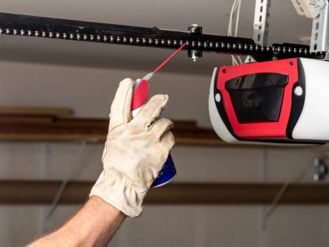 Lubricating a garage door opener during a tune-up